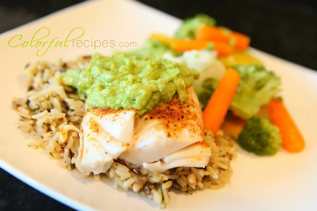 Baked Pacific cod fillet topped with creamy avocado sauce