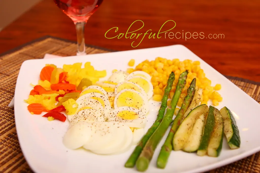 Eat, Pray, Love inspired dinner plate with boiled eggs and sautéed vegetables
