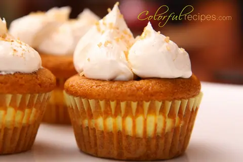 Pumpkin cheesecake cupcakes with whipped frosting