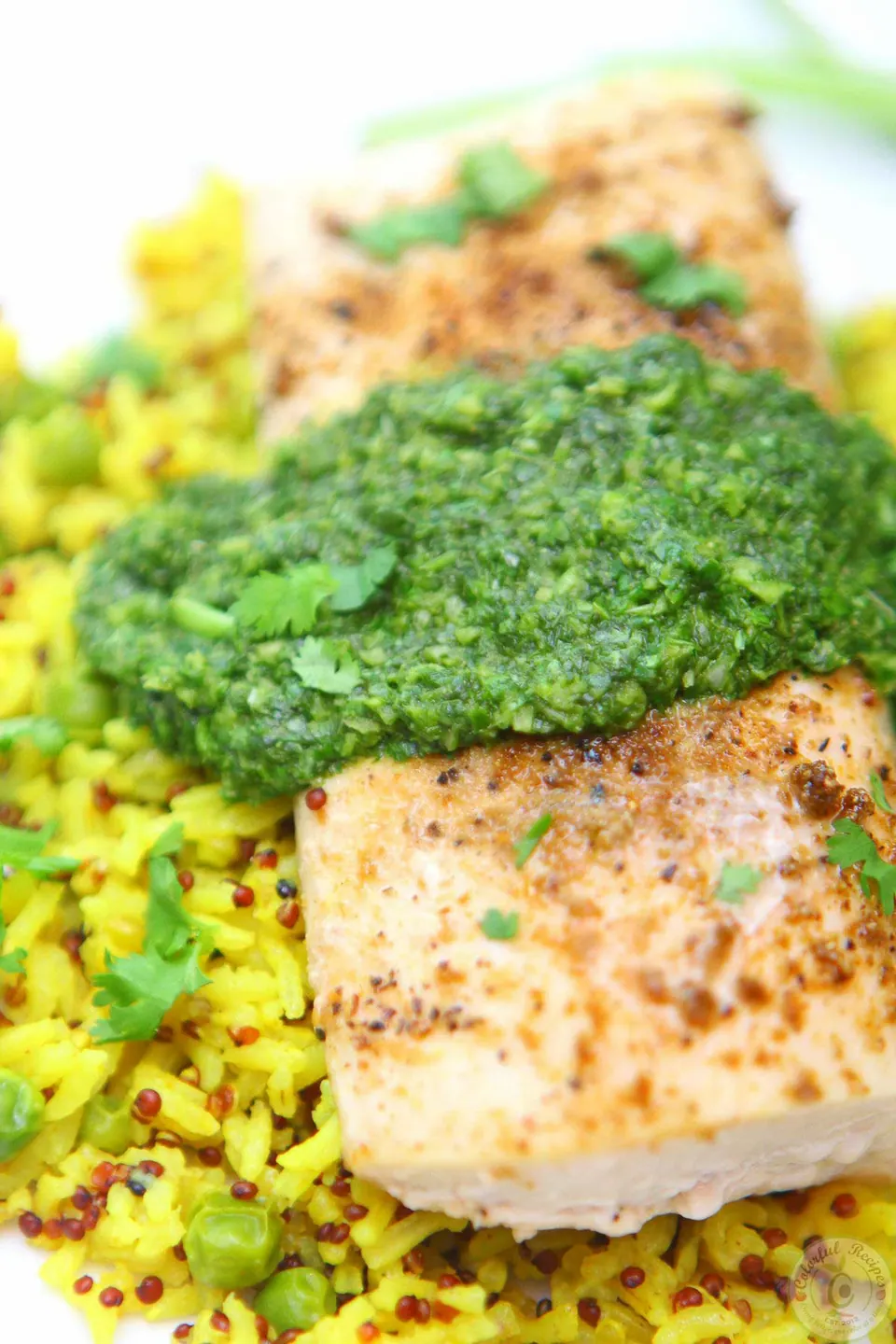 Baked mahi-mahi with cilantro chutney over turmeric rice with peas