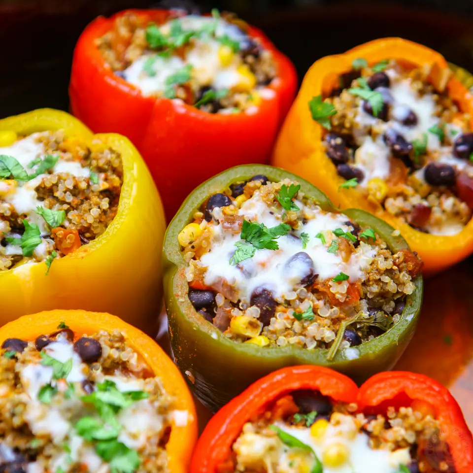 Crockpot stuffed peppers filled with quinoa, beef, black beans and melted cheese