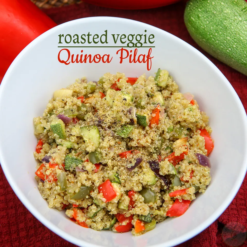 Bowl of roasted veggie quinoa pilaf with peppers and zucchini