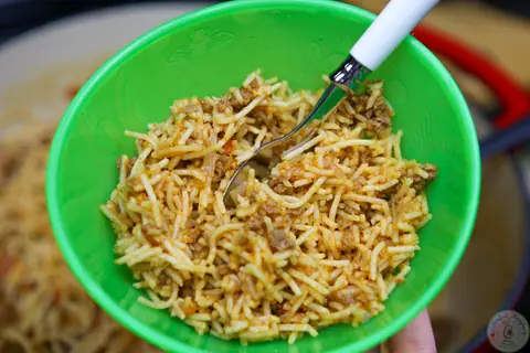 Bowl of toddler approved simple beef spaghetti in tomato sauce