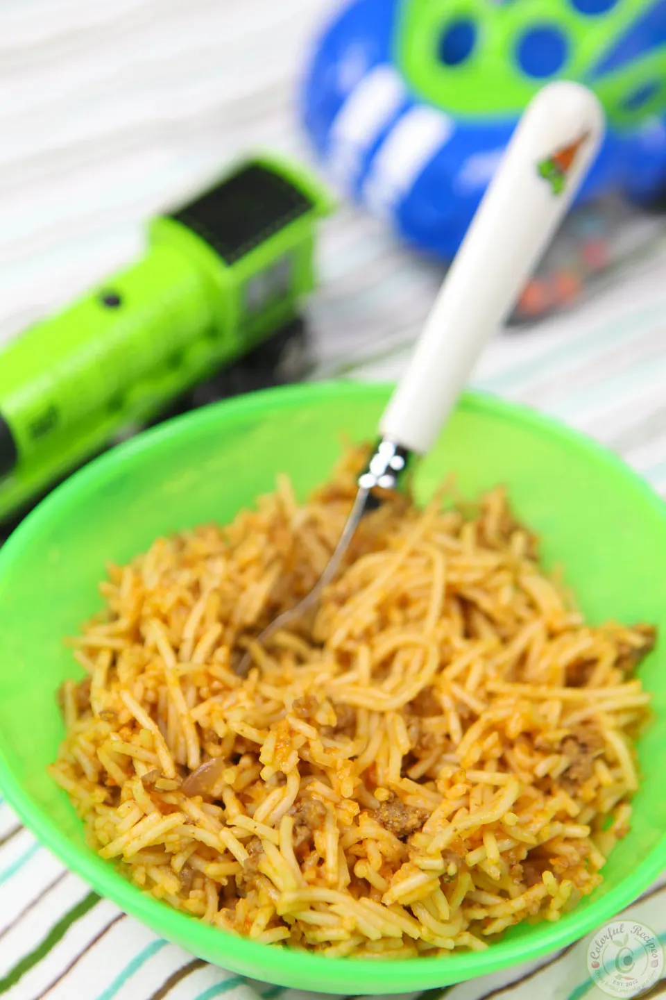 Bowl of toddler approved simple beef spaghetti in tomato sauce
