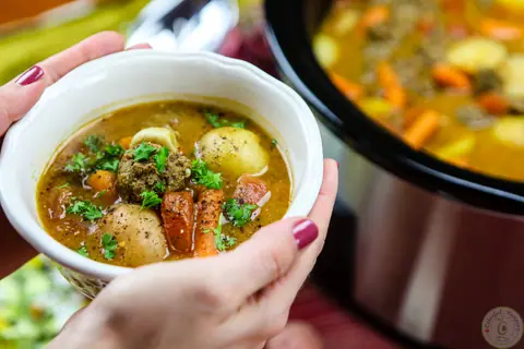 Bowl of slow cooker Lebanese kafta stew with meatballs, potatoes and carrots