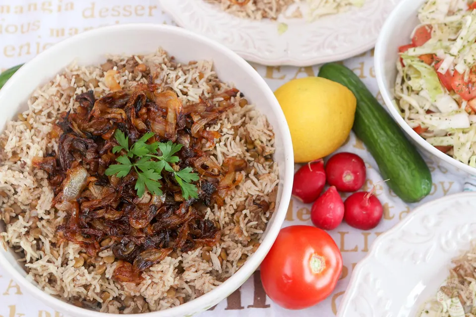 Plate of mdardara lentil rice pilaf with caramelized onions