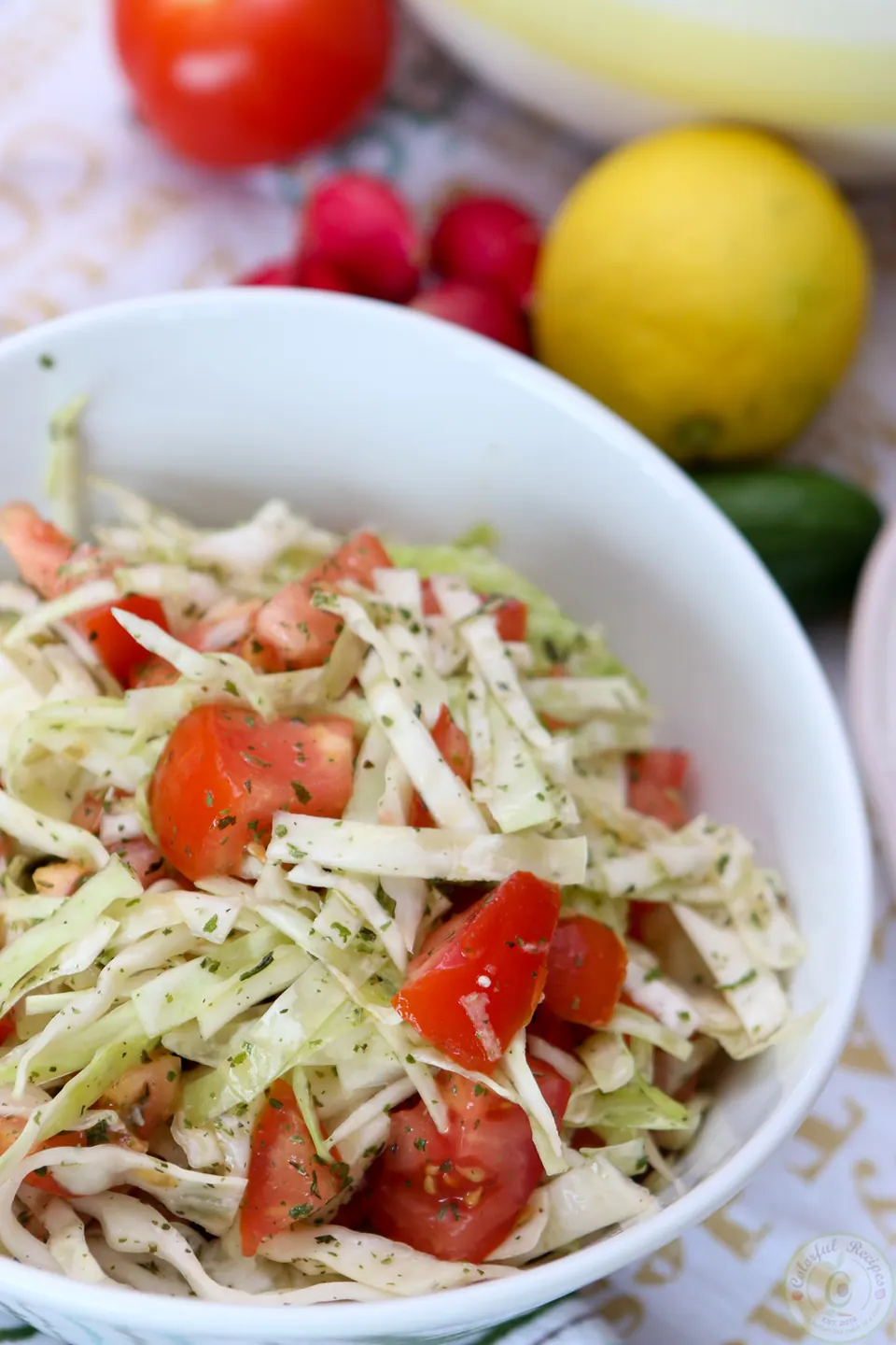Lebanese cabbage tomato salad with lemon, garlic and dried mint
