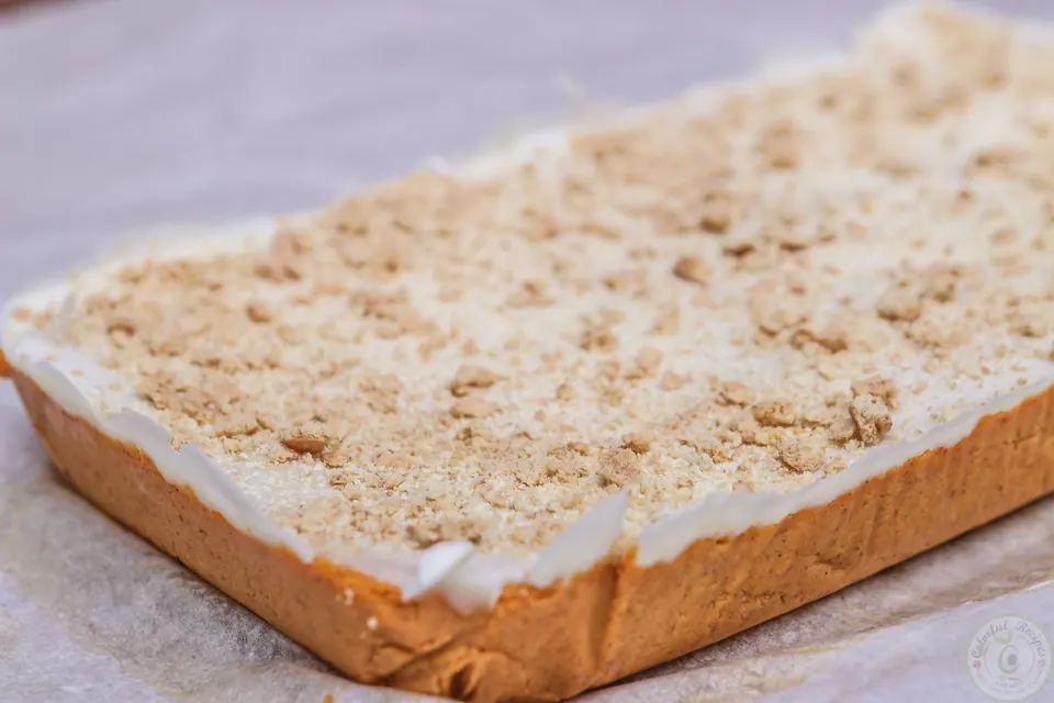 Knife cutting no bake pumpkin cheesecake into bites