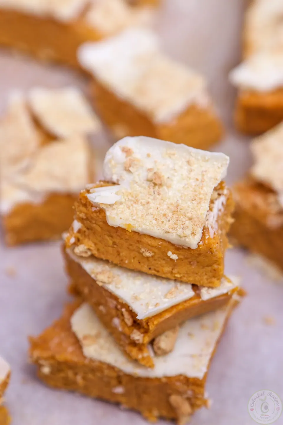 Close-up of a soft, creamy pumpkin cheesecake bite