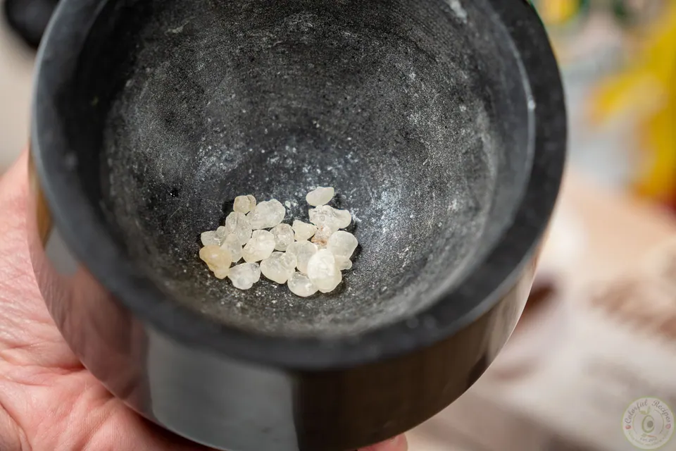 Mastic granules in a mortar for milk ice cream booza