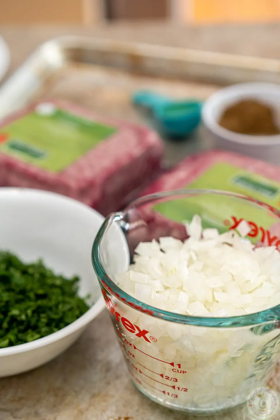 Finely minced onions and parsley for grilled lamb kafta kabobs