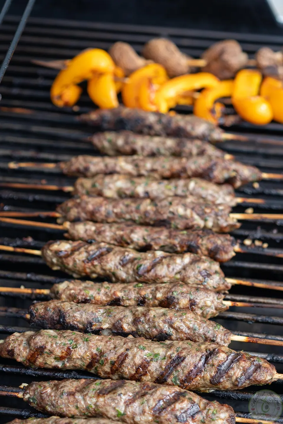 Lebanese kafta kabobs with grill marks on the grill