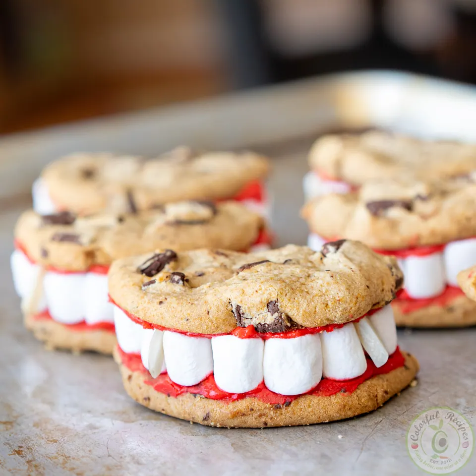 Close-up of vampire dentures Halloween cookies with marshmallow teeth