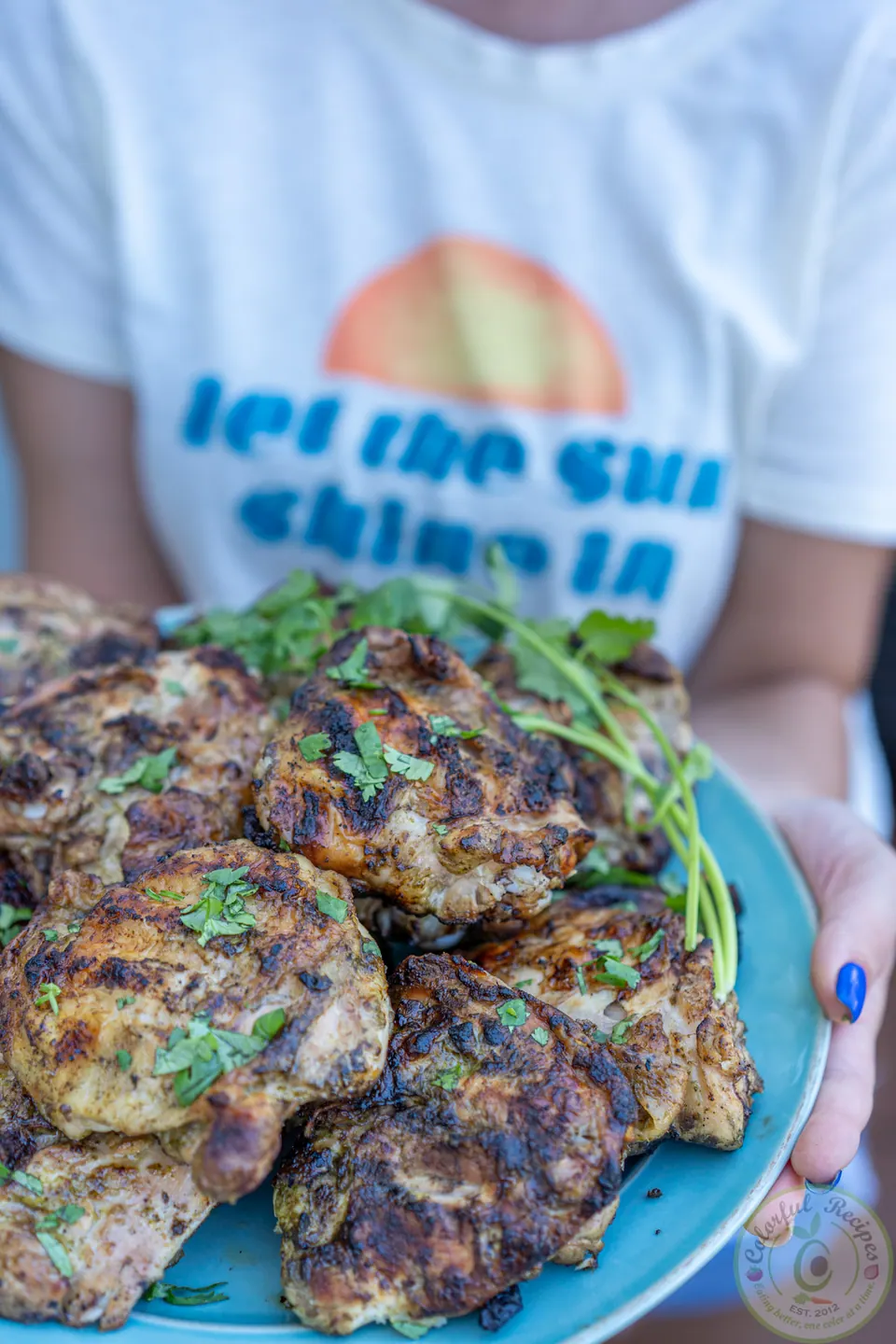 Cilantro lemon garlic grilled chicken thighs with crispy skin and grill marks