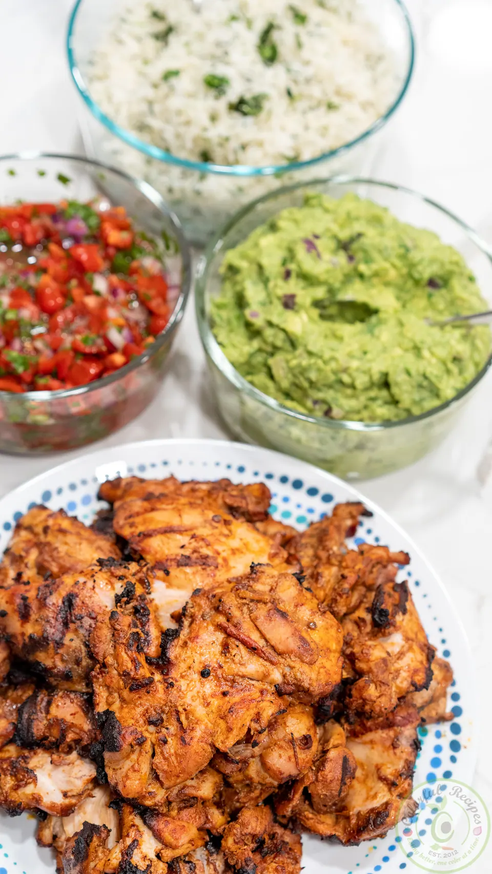 Chipotle chicken bowls with cilantro rice, pico de gallo salsa and guacamole
