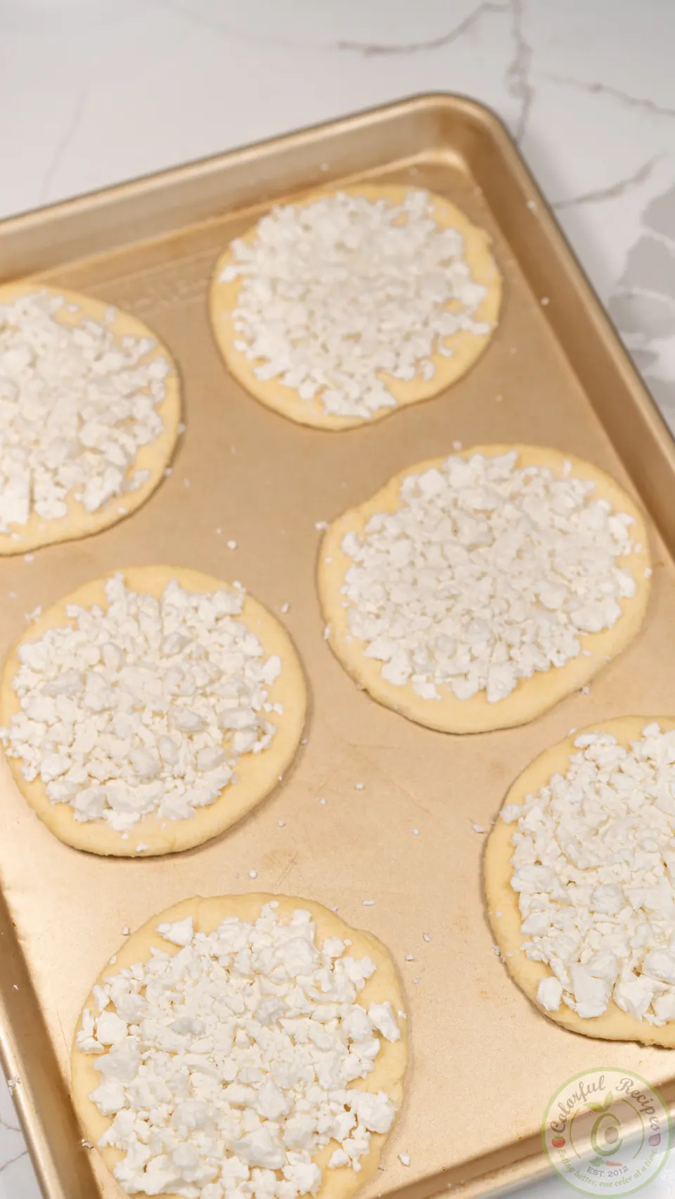 Unbaked small cheese manakish