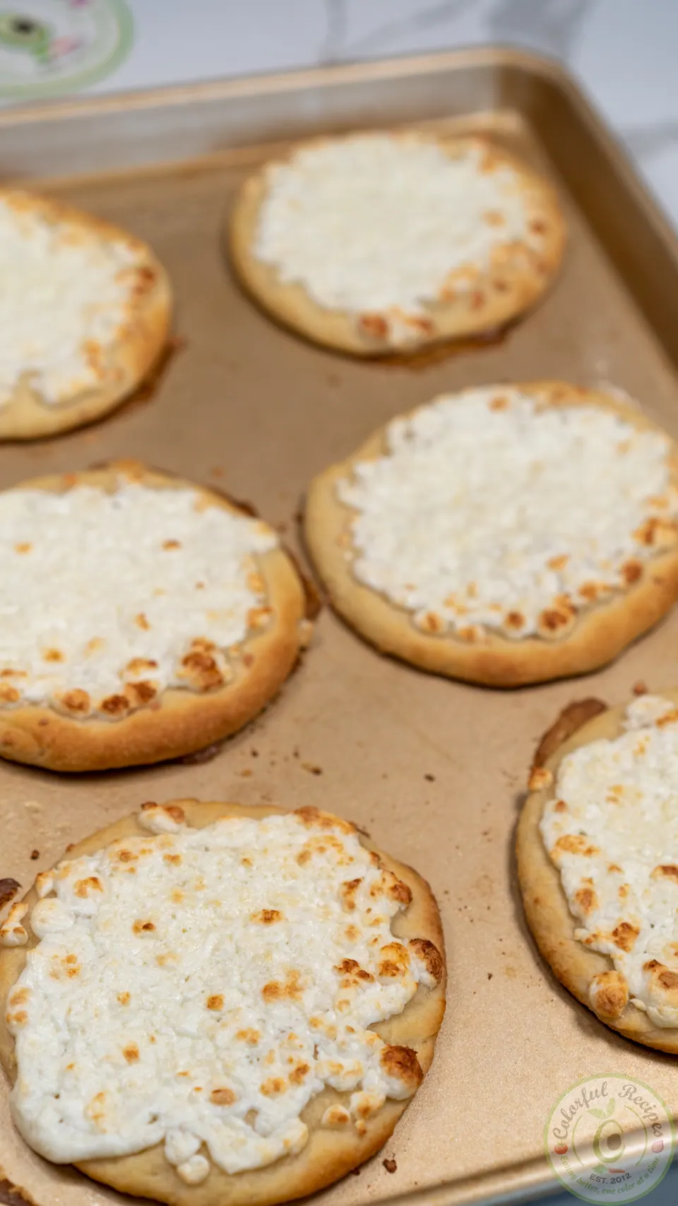 Tray of baked small cheese manakish