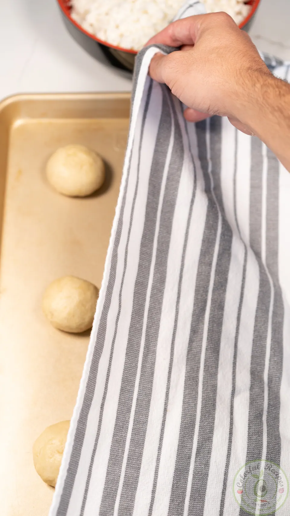 Covering manakish dough balls