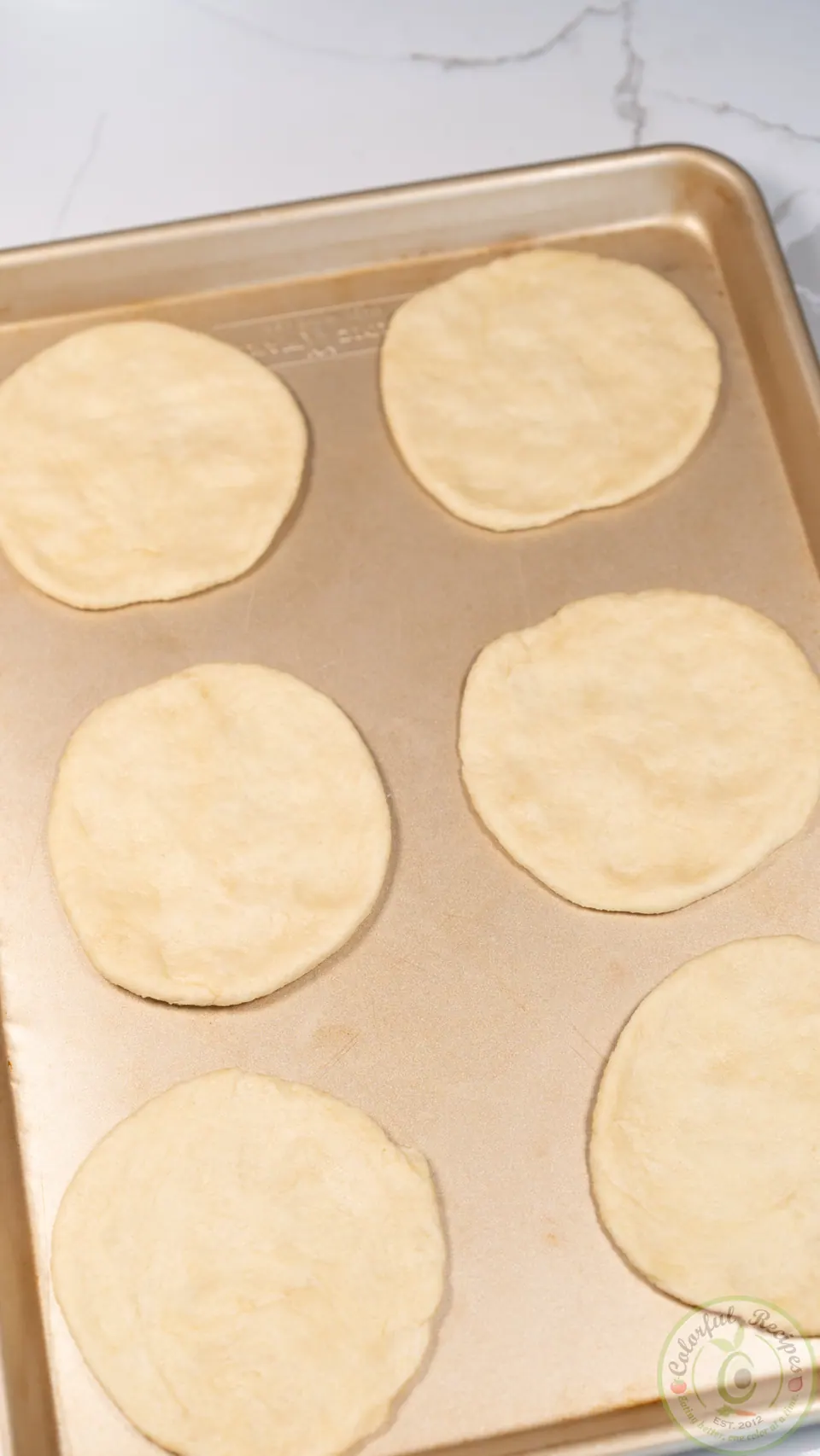 Flattened manakish dough rounds