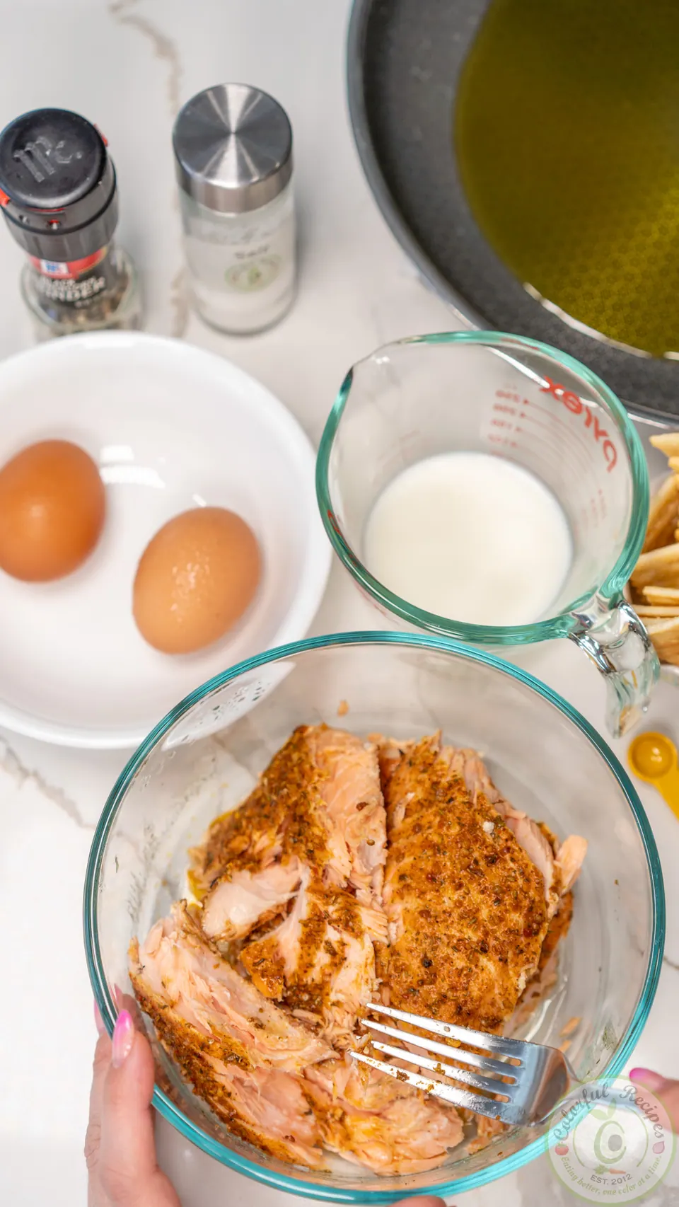 Flaking grilled salmon for salmon patties