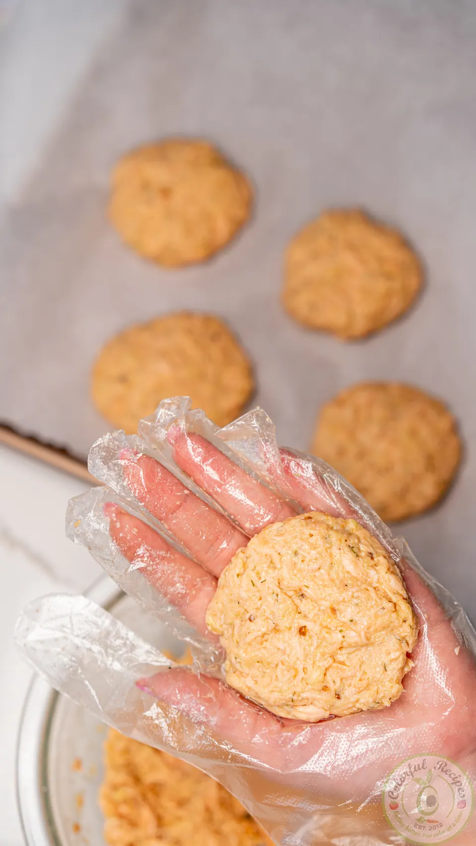 Shaping a salmon patty by hand