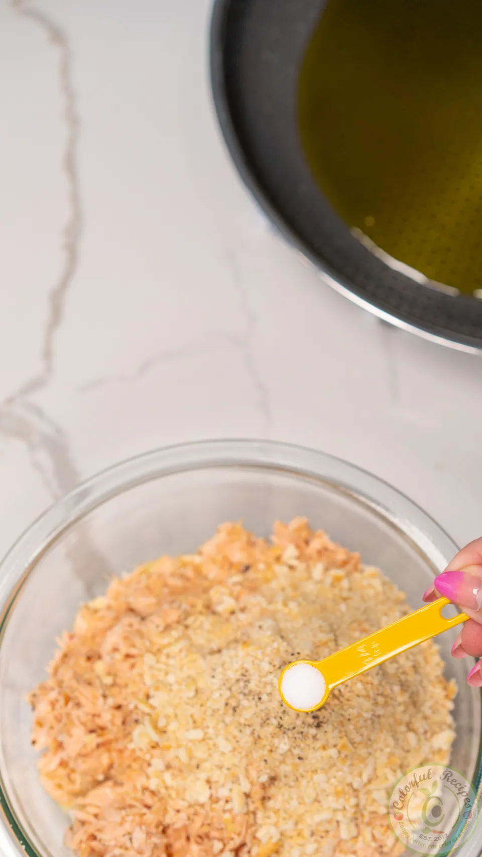 Seasoning the salmon patty mix