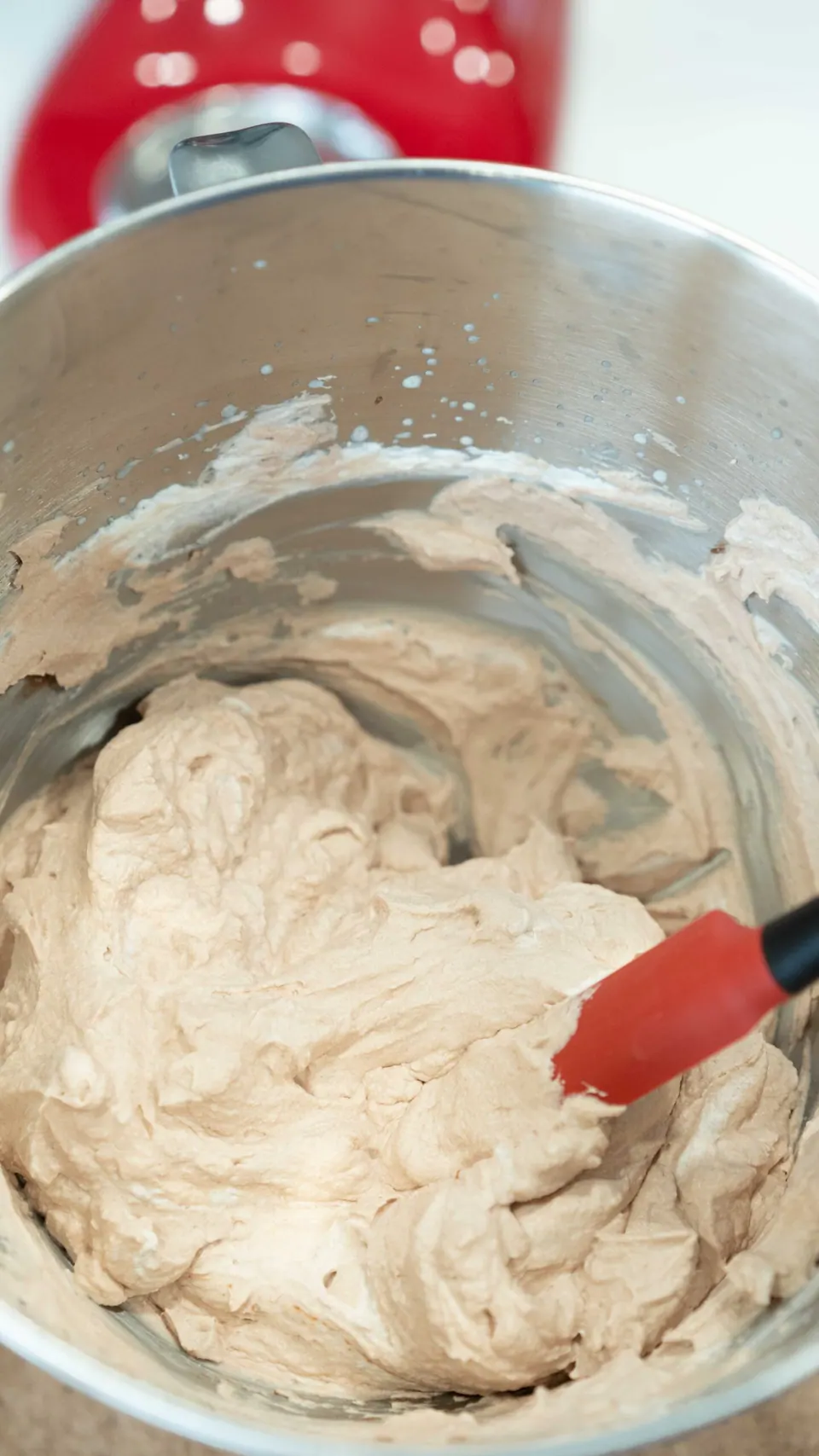 Bowl of Nutella whipped cream filling for the Christmas Yule Log cake