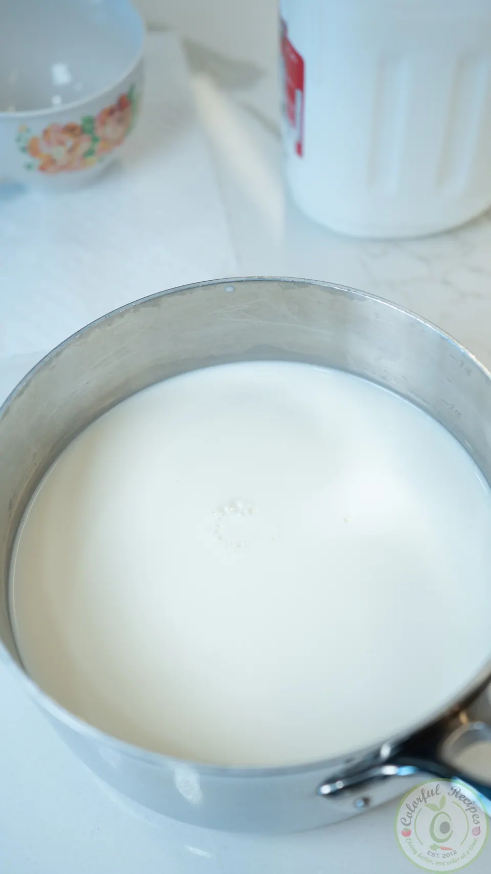 Pot of whole milk for making clotted ashta