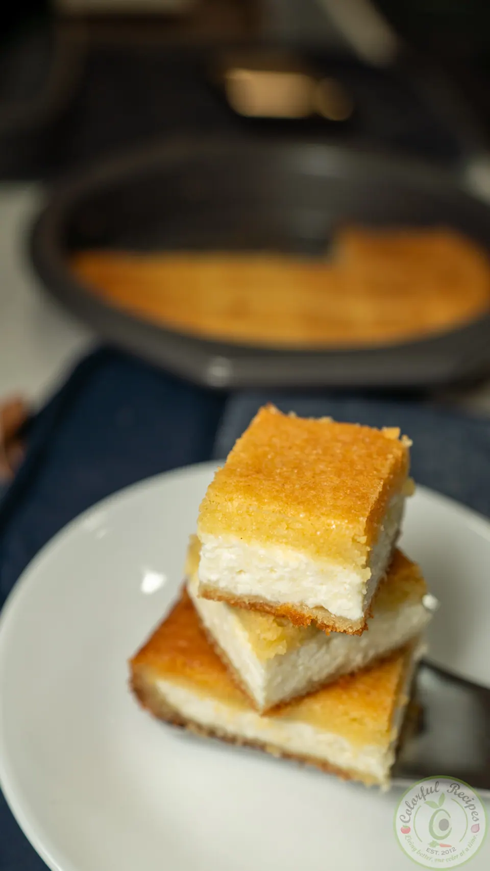 Squares of Maamoul Mad bi Ashta on a white plate