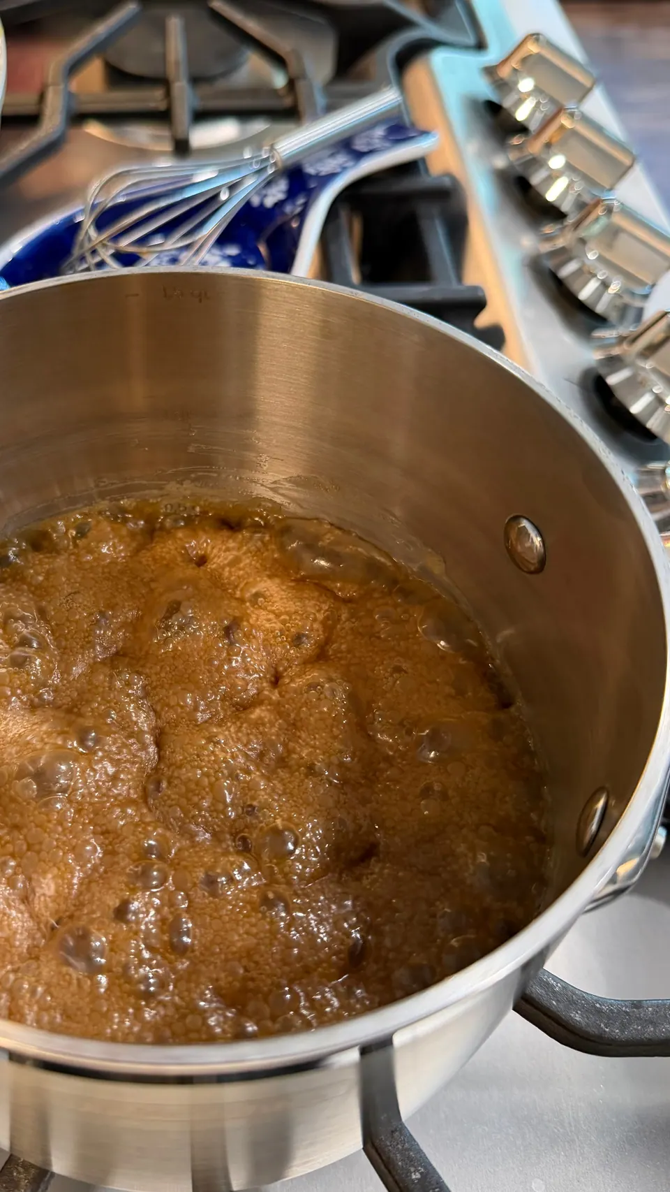 Brown sugar, butter and cream bubbling together in a saucepan