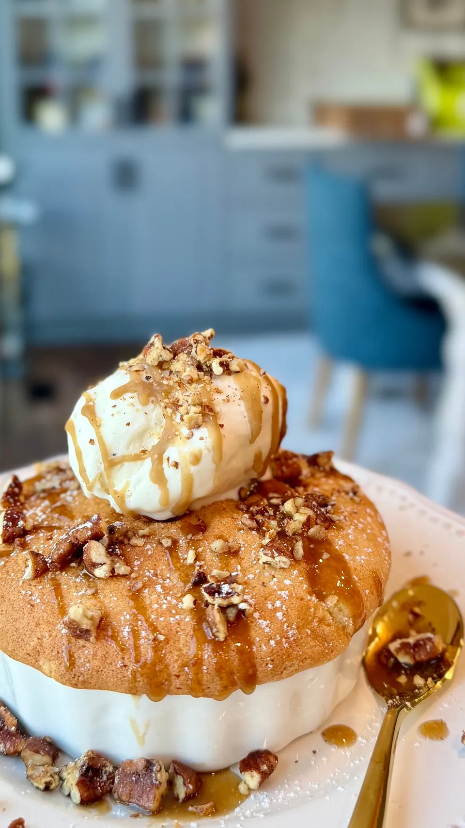 Bourbon butter cake topped with vanilla ice cream, bourbon caramel and candied pecans