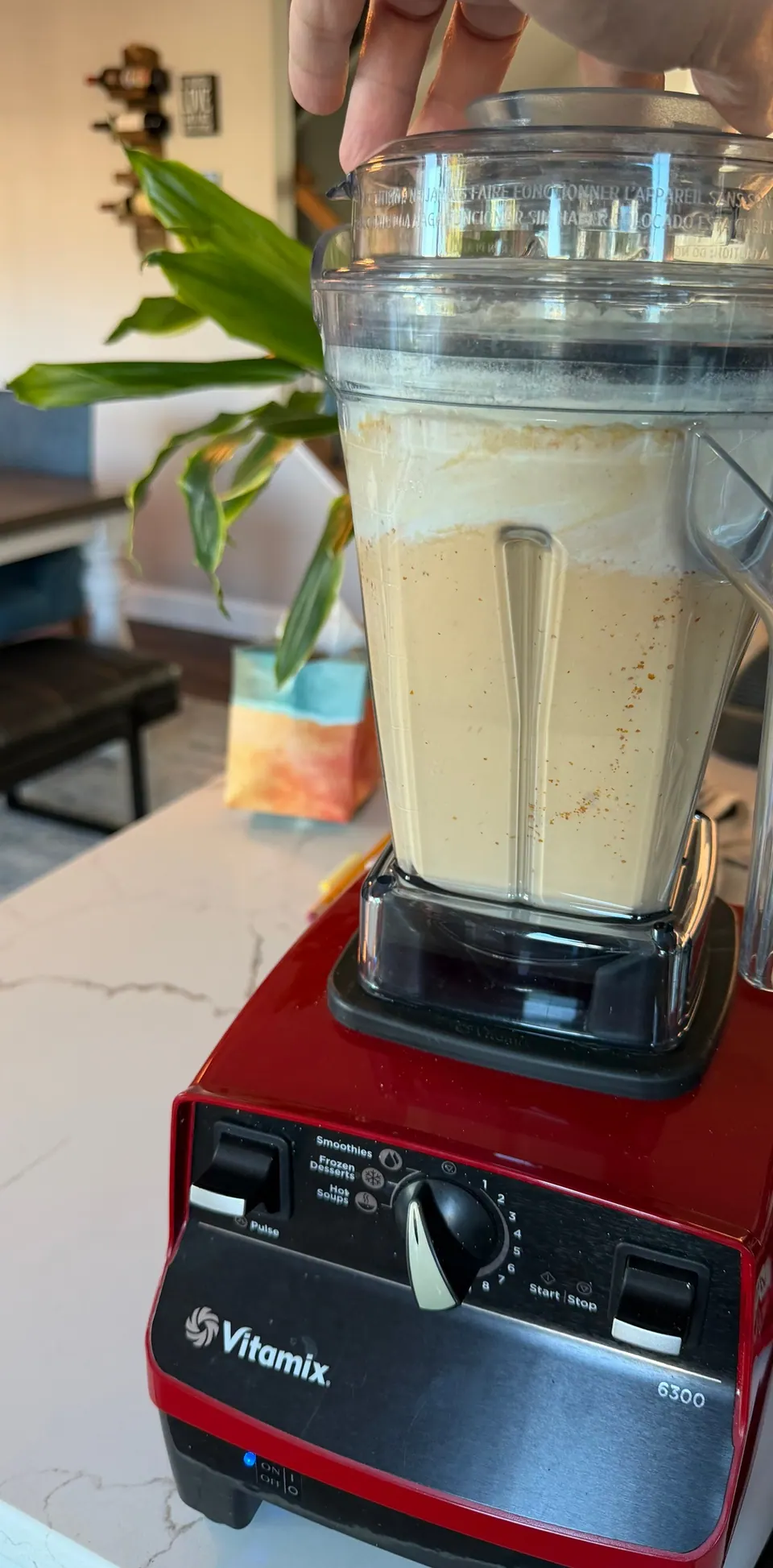 High-protein pumpkin pie filling in a large blender, full almost to the top